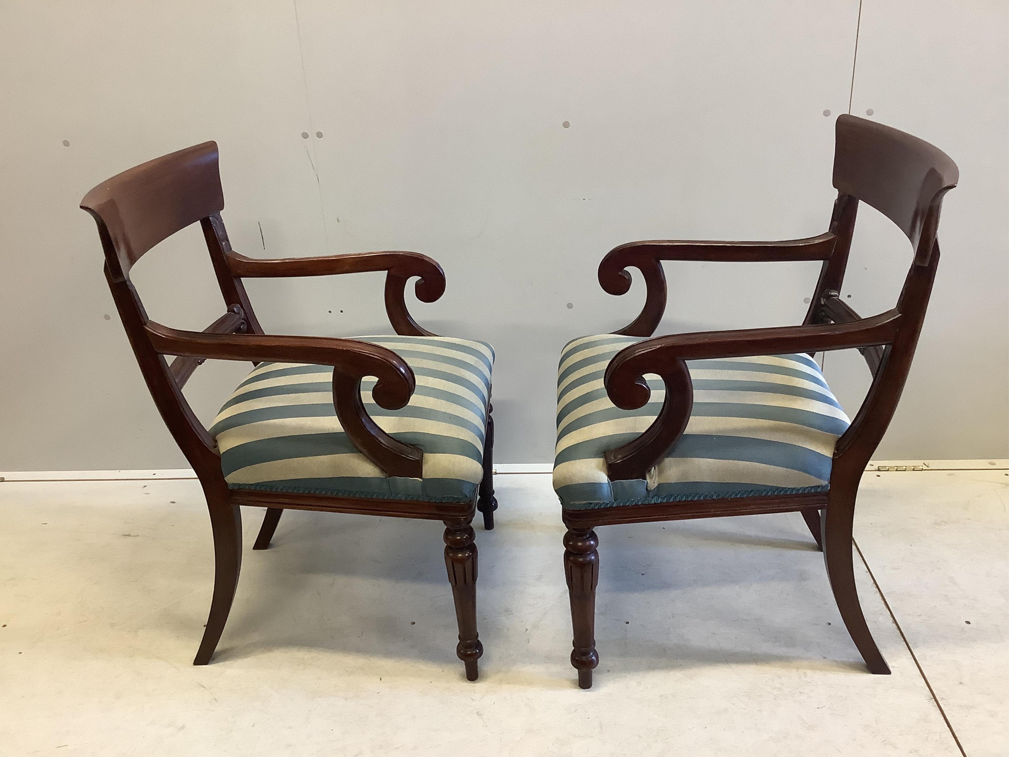 A set of eight William IV style mahogany dining chairs, two with arms. Condition - fair to good